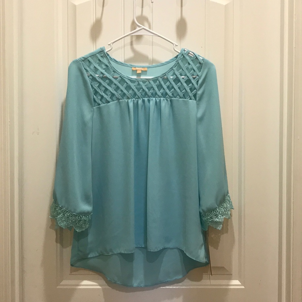 Takara size small shirt